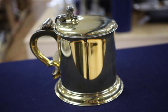 A good George V Charles II style Garrard & Co silver gilt replica tankard.
